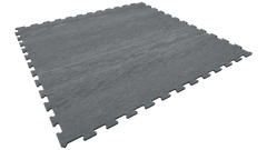 Dark gray interlocking foam floor tiles with a textured surface, shown at an angle on a white background.